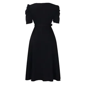 Back view of elegant black short sleeve midi dress with pleated puff sleeves and belt