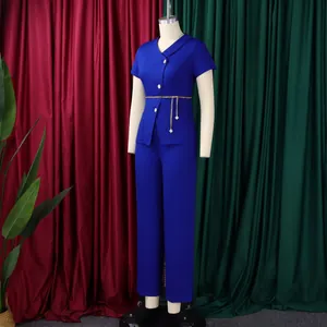 Elegant royal blue two-piece set featuring short-sleeve button-up top and matching trousers.