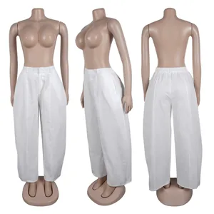 Detail view showing the loose silhouette of white wide-leg pants from three angles