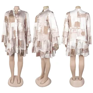 Detailed multi-angle views of an elegant loose V-neck mini dress with abstract print.
