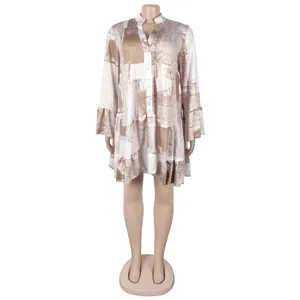 Detail of elegant loose floral print V-neck mini dress with ruffled sleeves
