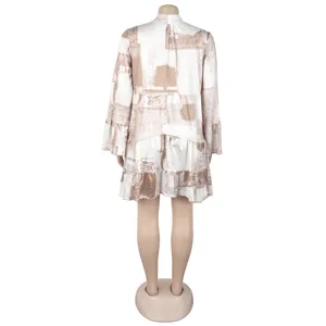 Back view of an elegant loose V-neck short dress with a brown abstract floral print