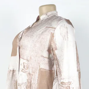 Detailed close-up view of elegant loose floral print V-neck color-blocked dress