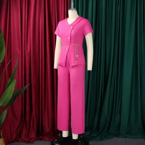 Front view of hot pink two-piece set with short sleeve top and wide leg trousers