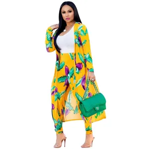 Elegant yellow two-piece set featuring long cardigan and pants with vibrant feather print