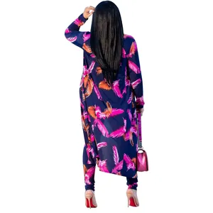 Back view of sexy two-piece set with vibrant pink and orange feather print on navy blue