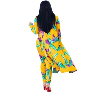 Back view of a yellow two-piece set with vibrant feather print and long cardigan