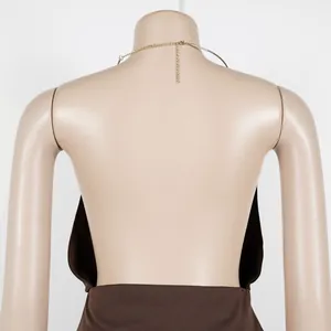 Detailed back view of an elegant brown halter neck backless two-piece set
