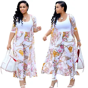 Detailed view of floral print long cardigan and matching leggings set in white