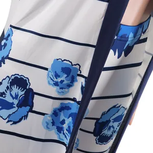 Macro view of the blue floral and striped print on sexy two-piece clubwear fabric