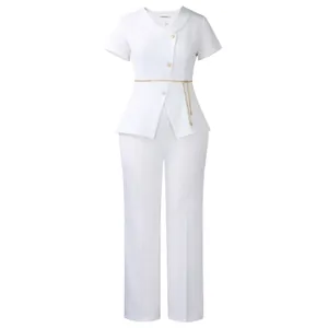 Detailed view of women's white two-piece suit with gold chain belt and flower buttons