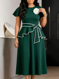 Elegant dark green short sleeve midi dress with peplum waist and white-bordered bow tie belt
