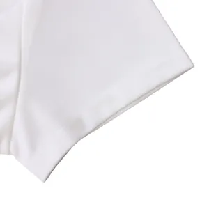 Close-up of the clean stitching and hem on a white short-sleeve casual top for women