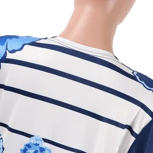 Detailed close-up view of the blue floral and striped pattern on this stylish cardigan set