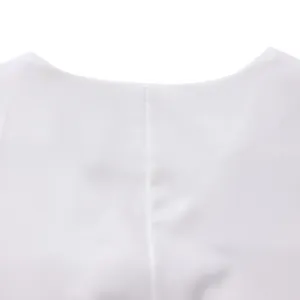 Close-up detail of the clean neckline stitching on a white casual short sleeve top