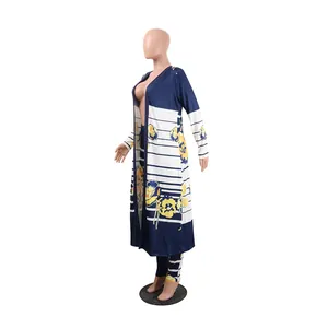 Detailed view of the navy blue floral and striped two-piece cardigan set.