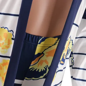 Detail view of sexy floral print two-piece set with long sleeve cardigan and stripes
