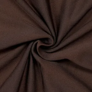 Close-up detail of premium dark brown pleated fabric with fine knitted ribbed texture