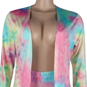 Detailed close-up of vibrant tie-dye printed long-sleeve cardigan and matching set for women