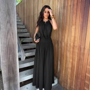 Elegant black halter pleated top and wide-leg trousers two-piece set for modern women