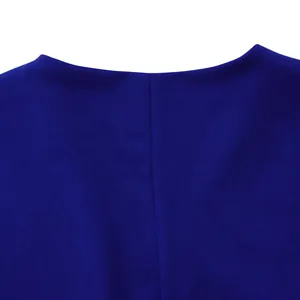 Close-up detail of the smooth neckline and textured royal blue fabric on summer top