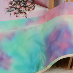 Detailed macro view of multi-color tie-dye printed fabric for sexy nightclub clothing