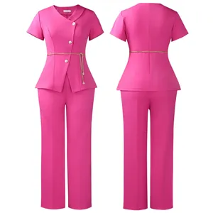 Pink two-piece set featuring short sleeve top with daisy buttons and wide leg pants