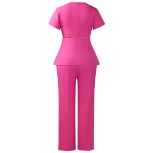 Back view of pink two-piece set with short sleeve top and straight pants