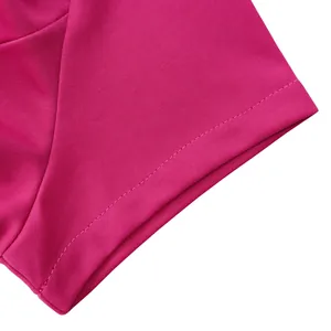 Close-up of the professional stitching and smooth fabric on the magenta sleeve detail.
