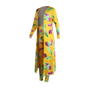 Full view of a vibrant yellow two-piece clothing set featuring colorful feather print.
