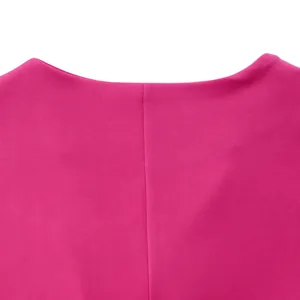 Close-up detail of the pink fabric texture and neckline of the summer casual top set.