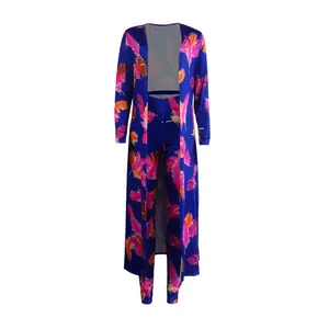 Detailed front view of sexy blue two-piece set featuring a vibrant feather print design