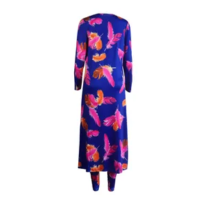 Back view of a long-sleeved cardigan and leggings set with vibrant feather prints