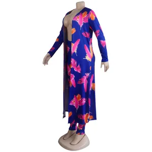 Side profile of royal blue two-piece set featuring vibrant feather print detail