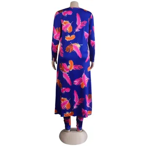 Rear view of vibrant blue two-piece set with pink feather print pattern
