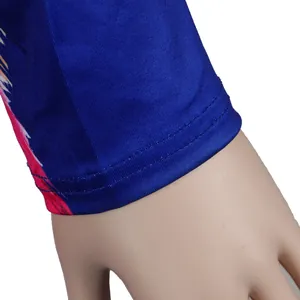 Close-up detail of double-stitched sleeve cuff on blue floral printed nightclub outfit