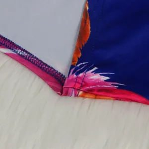 Close-up detail of high-quality stitching on blue floral print sexy two-piece set outfit