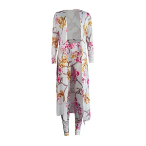 Detail view of sexy floral and baroque print long cardigan and pants two-piece set
