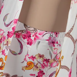 Detail shot of sexy floral print long sleeve cardigan and pants two-piece set.