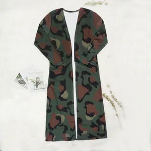Detailed view of long-sleeved camouflage print open cardigan on soft white background