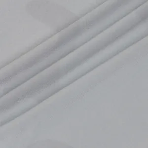 Macro view of soft grey ribbed fabric texture for women's two-piece set