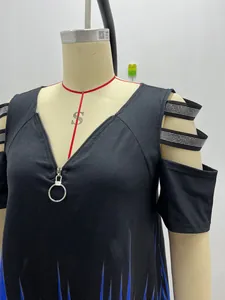 Detail view of a black V-neck T-shirt with zipper and rhinestone cutout shoulders.