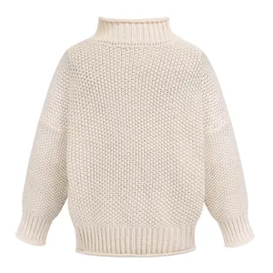 Close-up detail of cream-colored chunky knit high-neck pullover sweater for women