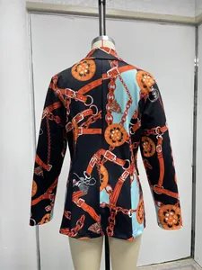 Back view of women's printed blazer featuring bold chain and belt pattern on mannequin