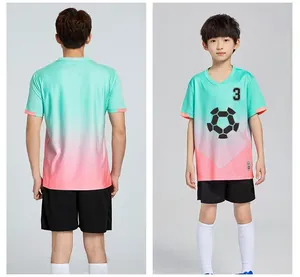 Front and back view of kids' gradient mint green and pink soccer jersey set