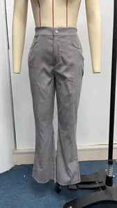 High-waisted grey corduroy flare pants featuring a classic button closure for women