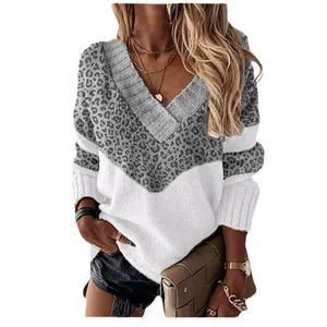 Women's V-neck long sleeve sweater with chic leopard print and white color block pattern.