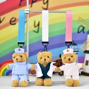 Cute doctor and nurse teddy bear plush toys in colorful medical scrubs for gifts.