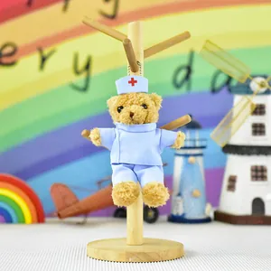 Detailed macro shot of a cute plush teddy bear wearing a blue nurse uniform and cap