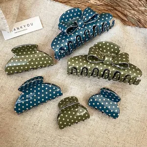 Acrylic polka dot hair claw set with bow and shark clips in teal and olive green